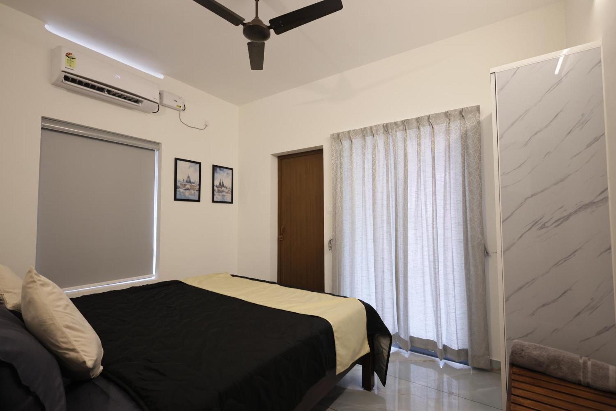 Appartamento Indigo Springs Thiruvananthapuram Esterno foto
