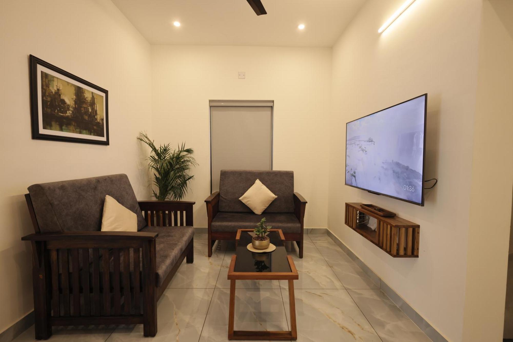 Appartamento Indigo Springs Thiruvananthapuram Esterno foto